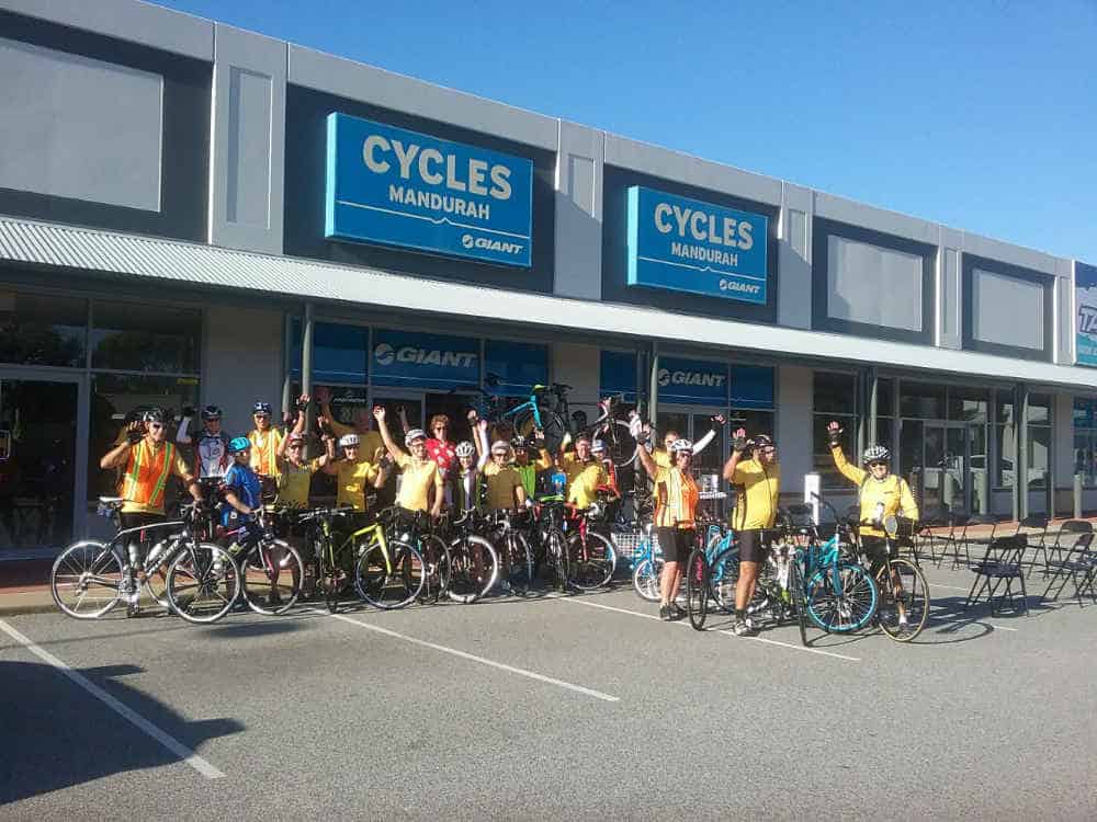 Arms up outside Cycles Mandurah